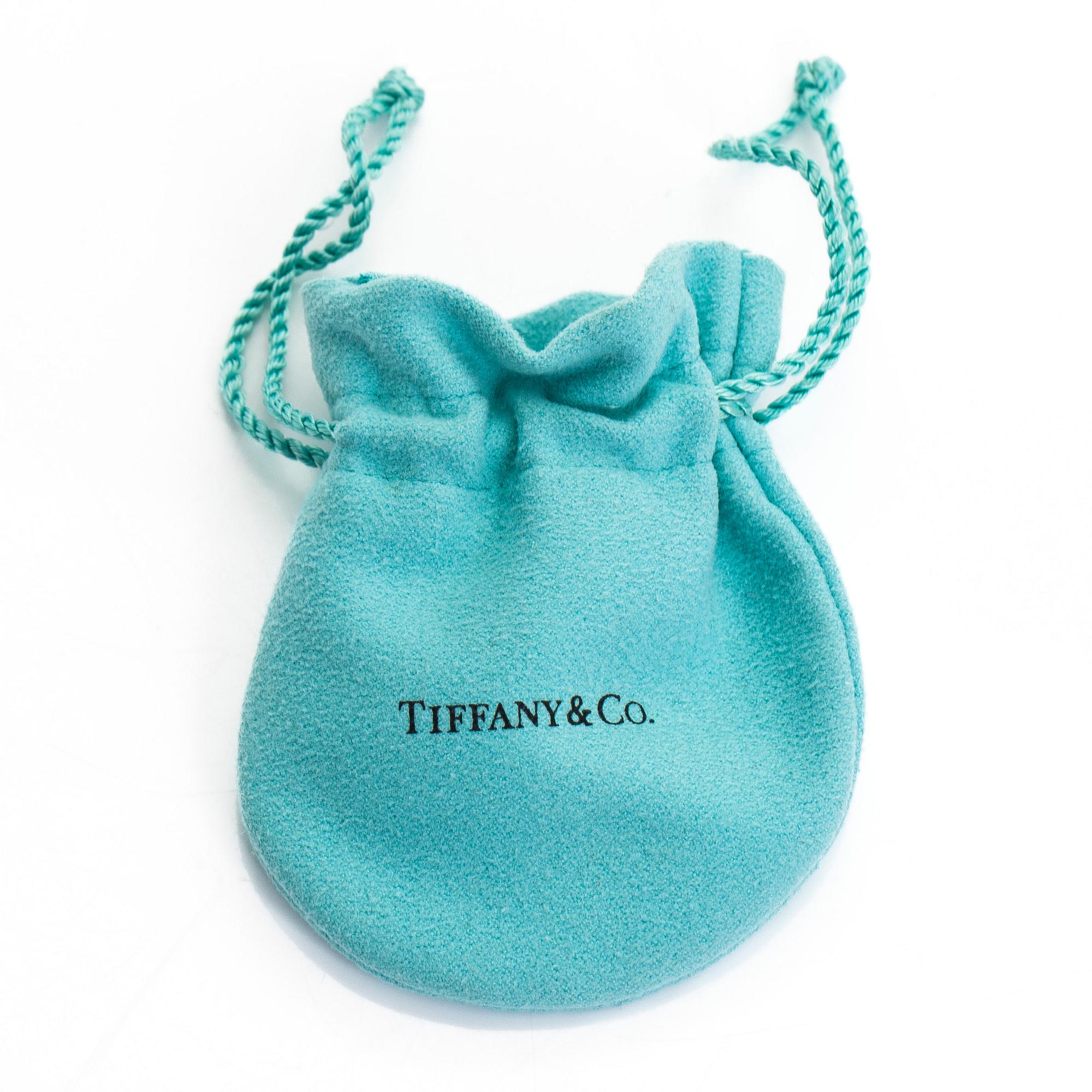 Tiffany & Co, Elsa Peretti, an 18K gold bracelet, 'Diamonds by the Yard', with a diamond approximately 0.08 ct.