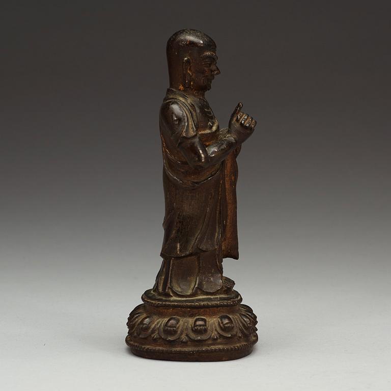 A bronze figure of a Lohan, Ming dynasty, 17th Century.