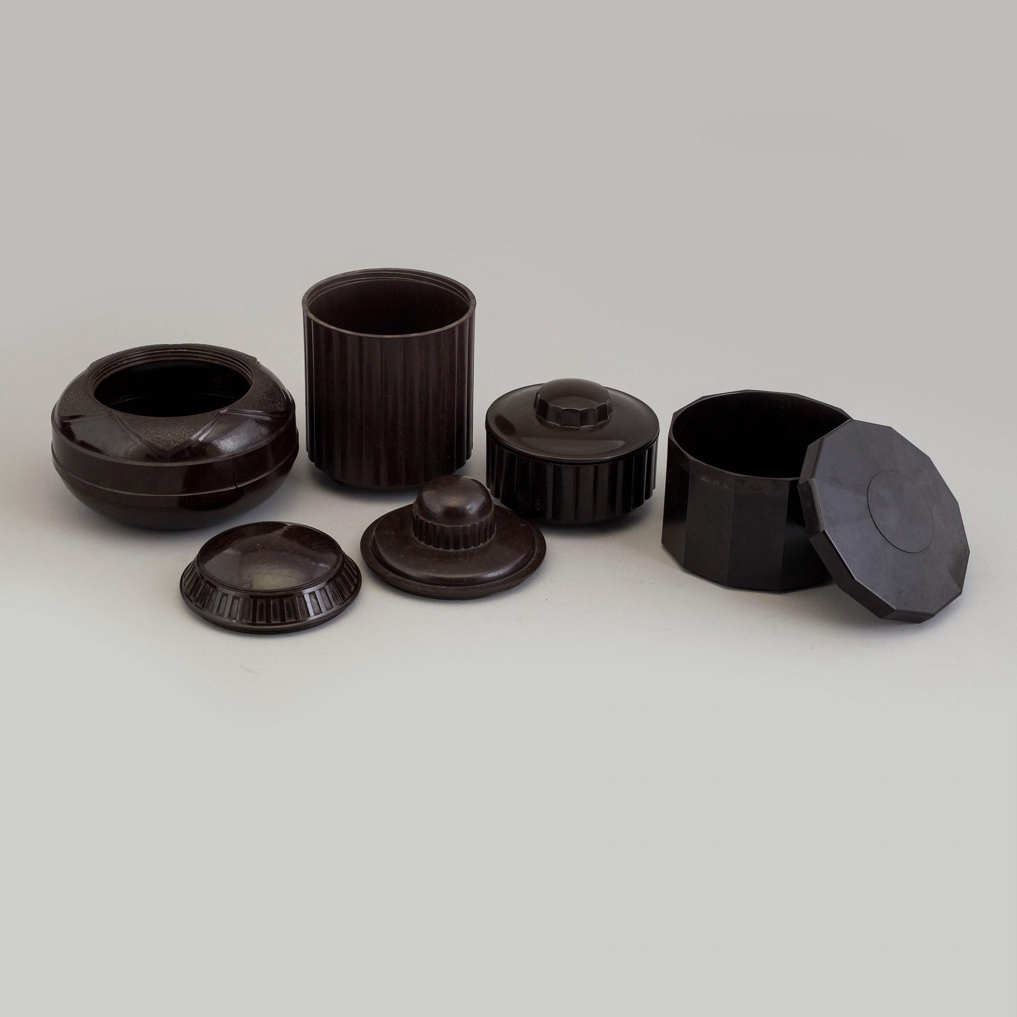 a set of 7 bakelit boxes from France, 1930's.