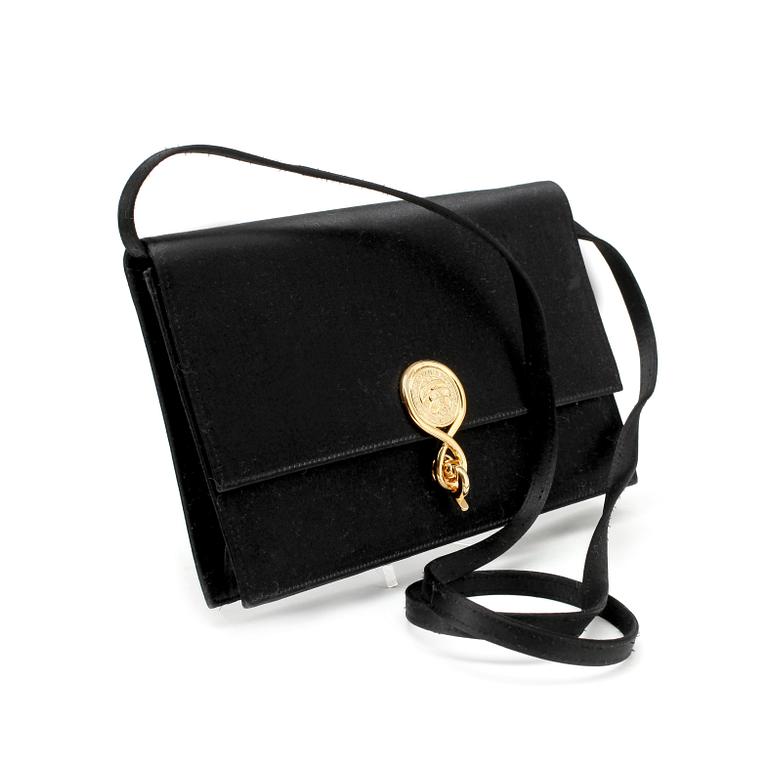 CÉLINE, a black satin eveningbag / clutch.