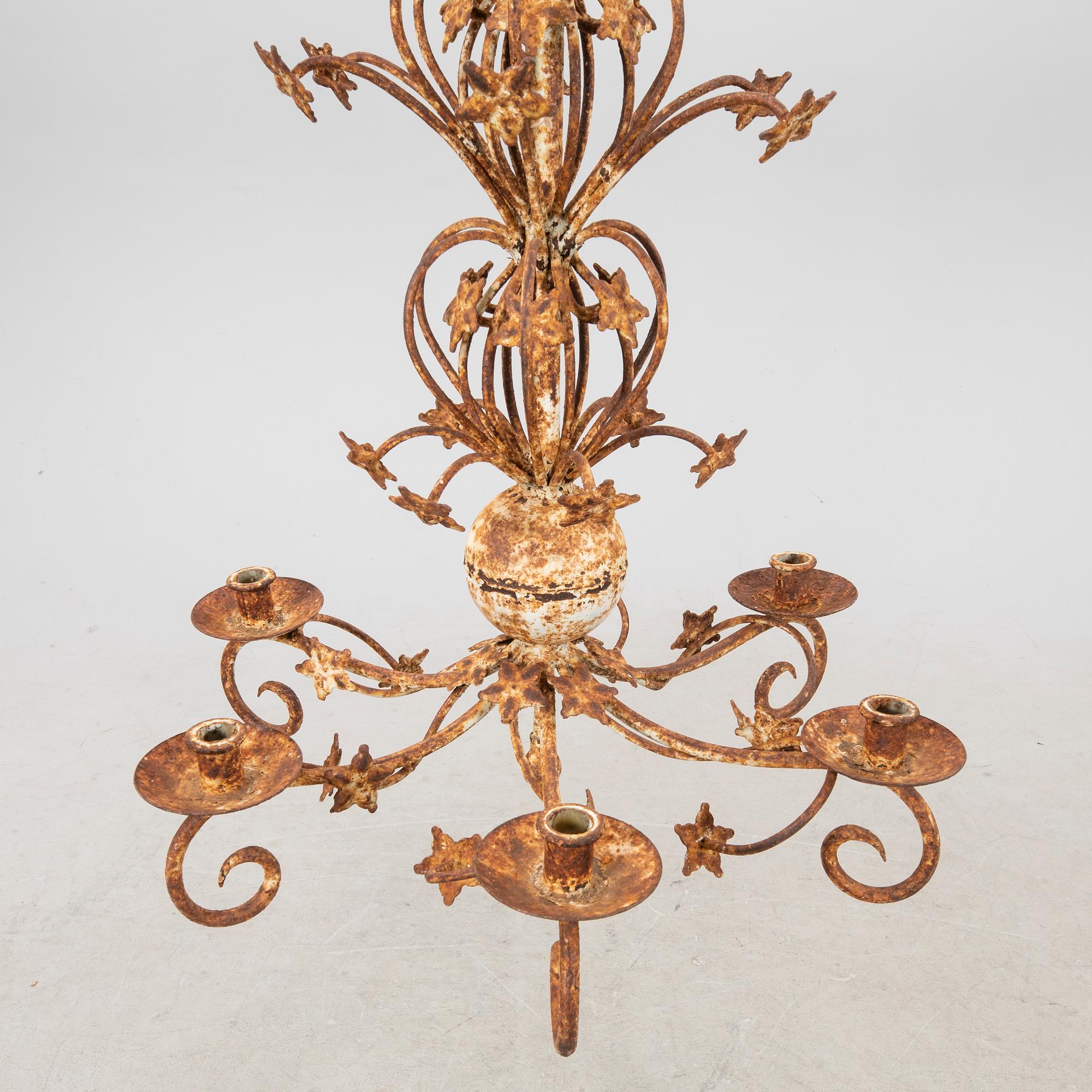 A metal ceiling pendant around 1900.