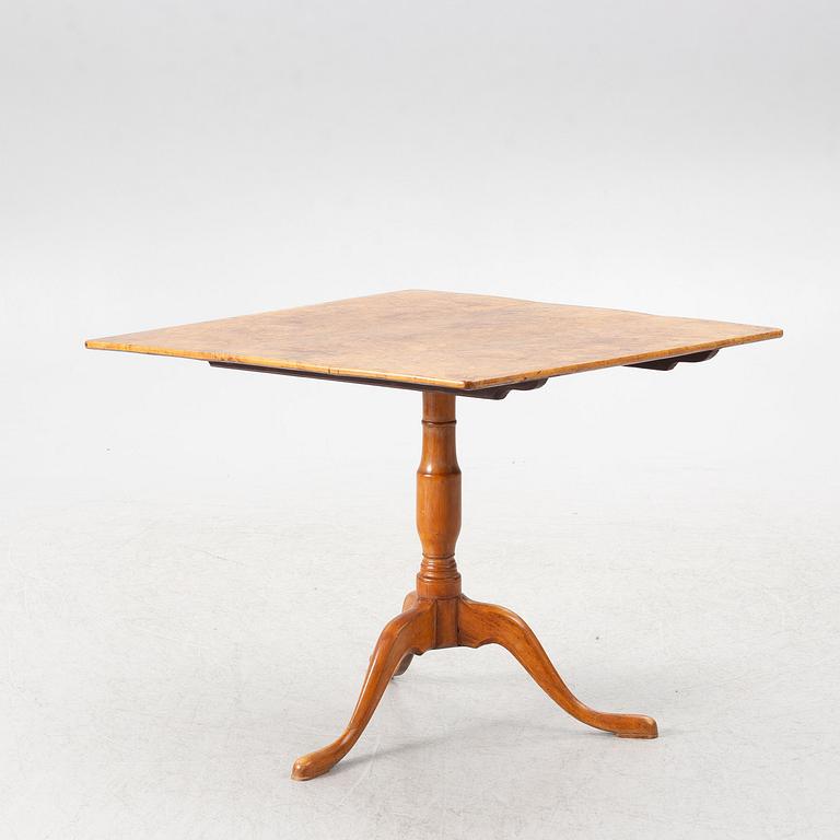 A burr alder tilt-top table, Mälardalen, circa 1800.