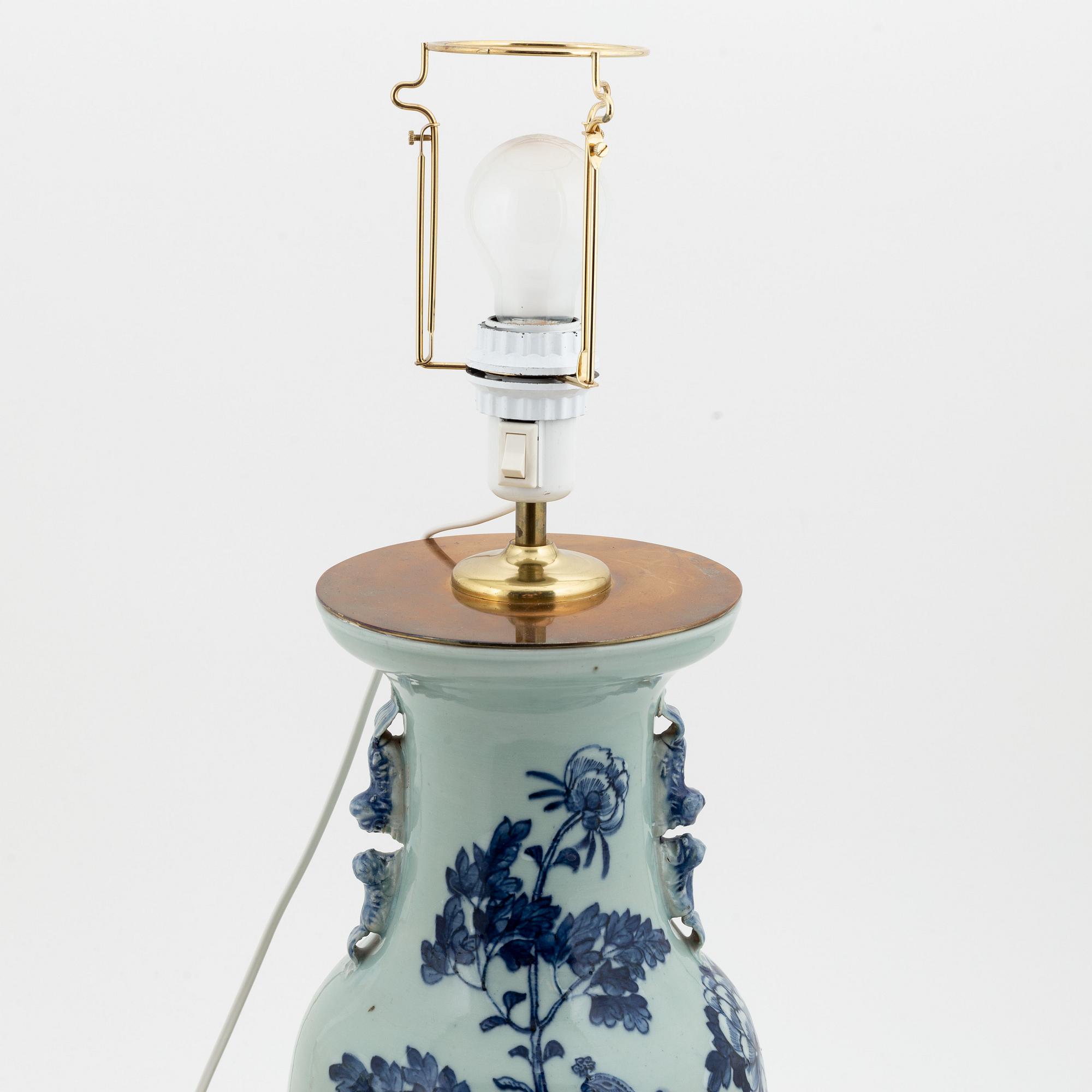 A matched pair of blue and white celadon ground vases moutned as table lamps, China, circa 1900.