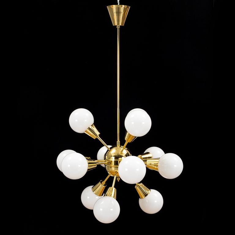 a brass and glas "Sputnik"-model ceiling light from the second half of the 20th century. Height ca 100 cm.