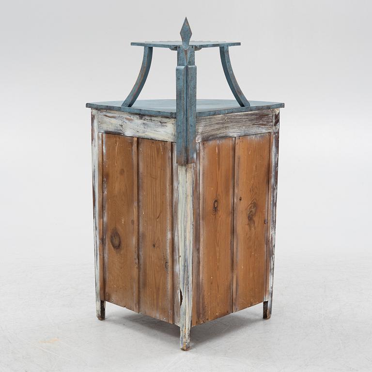 A painted corner cabinet, late 19th century.