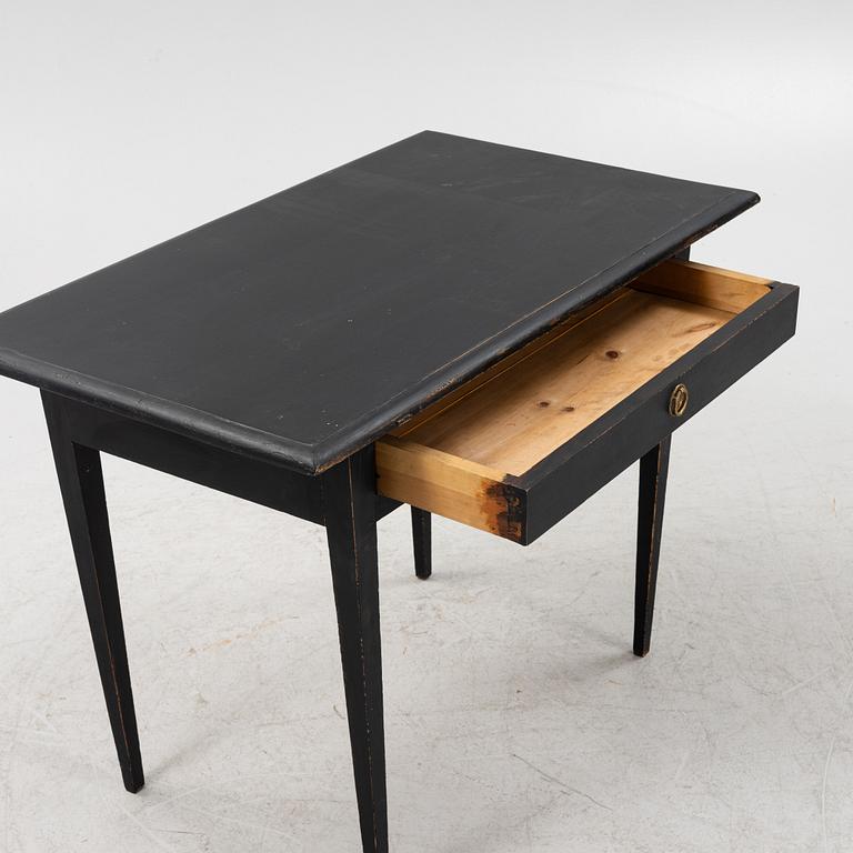 A painted table with a drawer, 19th/20th Century.