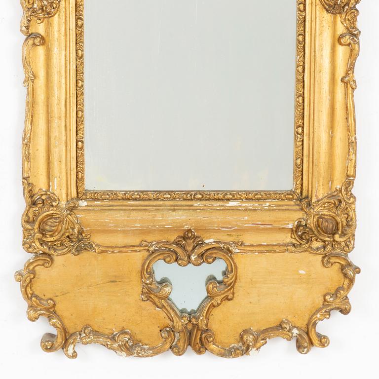 A late 19th Rococo style century mirror.