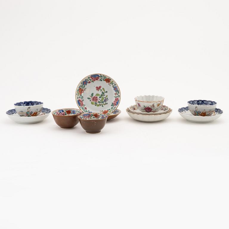 A group of five famille rose cups with saucers (2+2+1) and a saucer, Qing dynasty, Qianlong (1736-95).