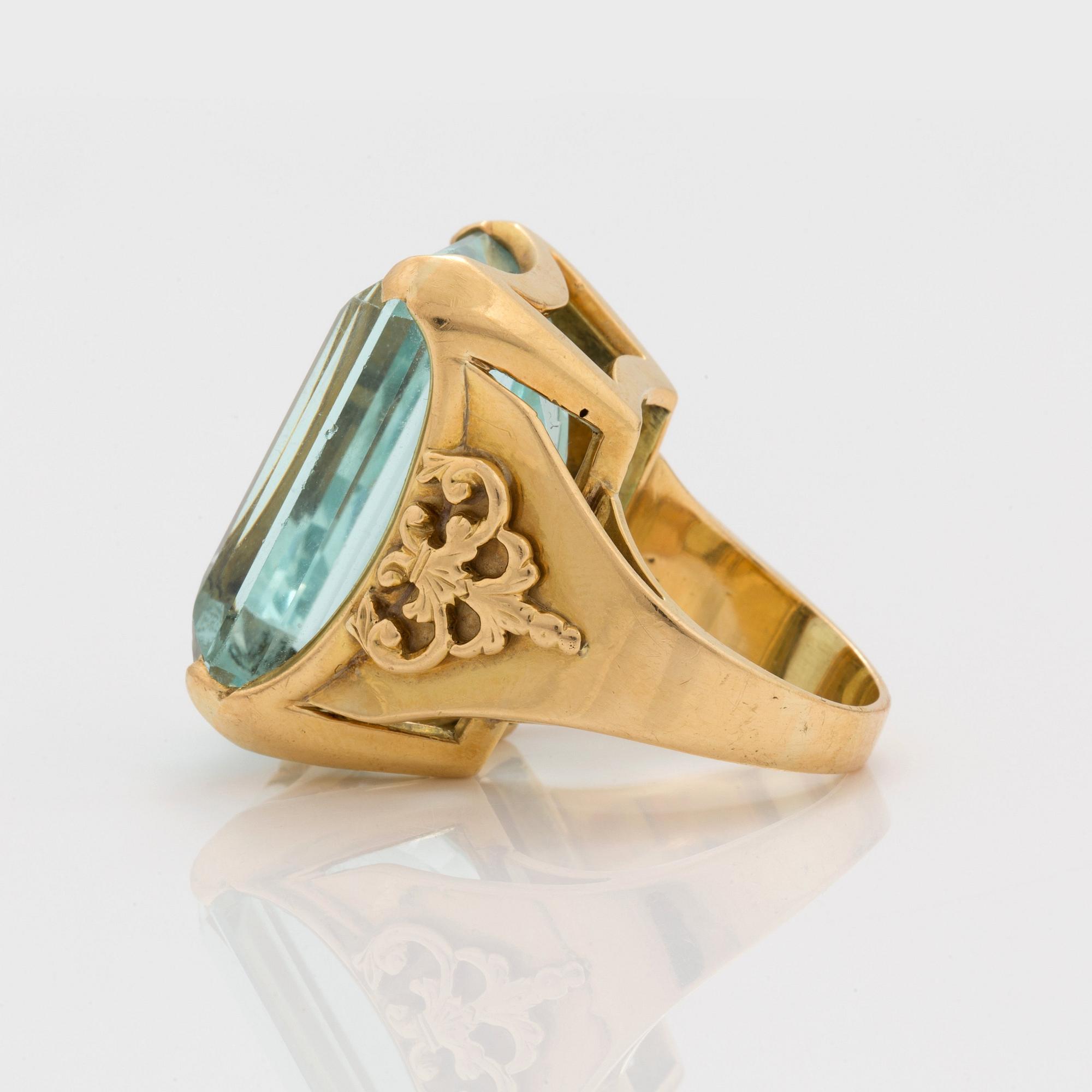 A circa 45.00 ct step cut aquamarine ring.