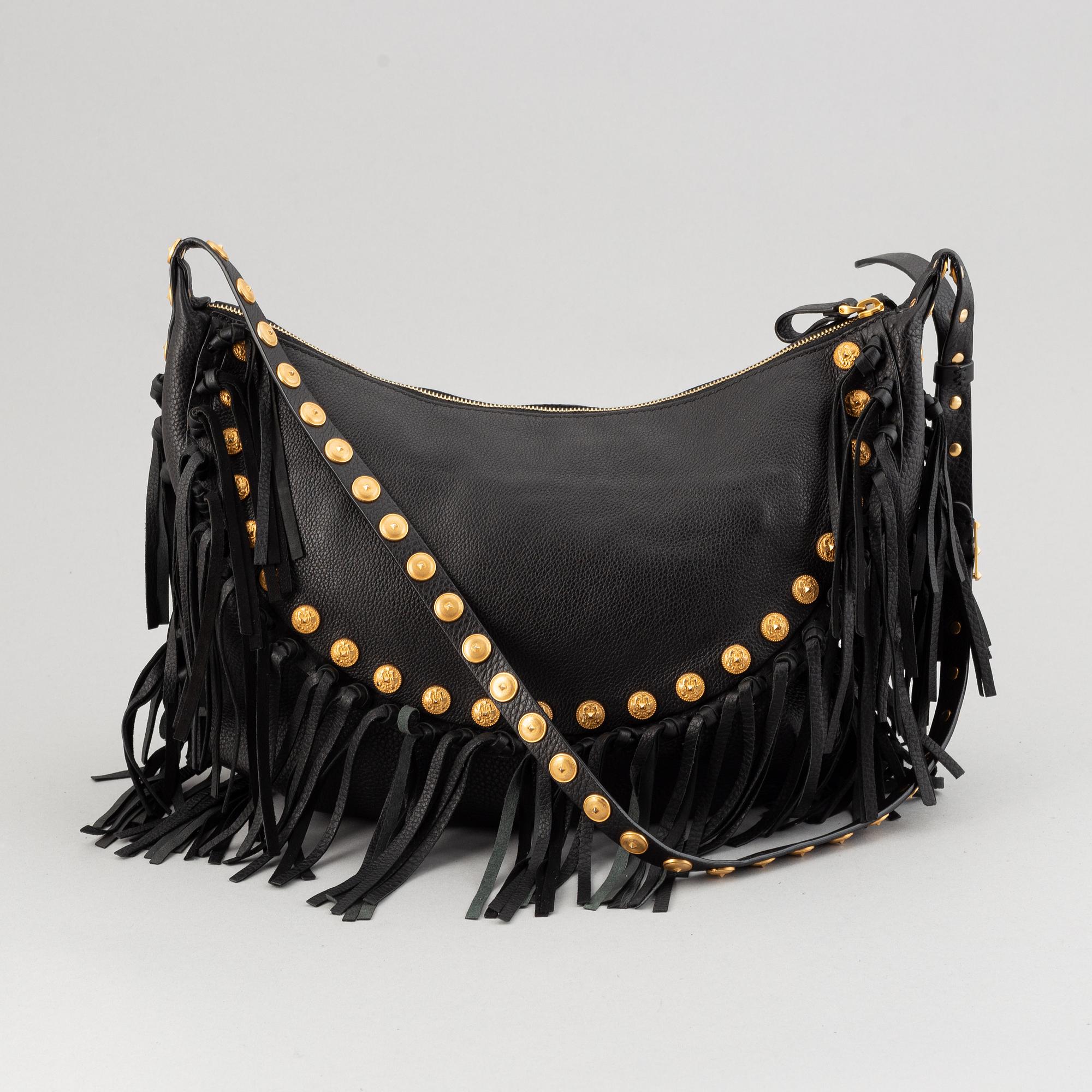 Valentino, a black leather hobo bag.
