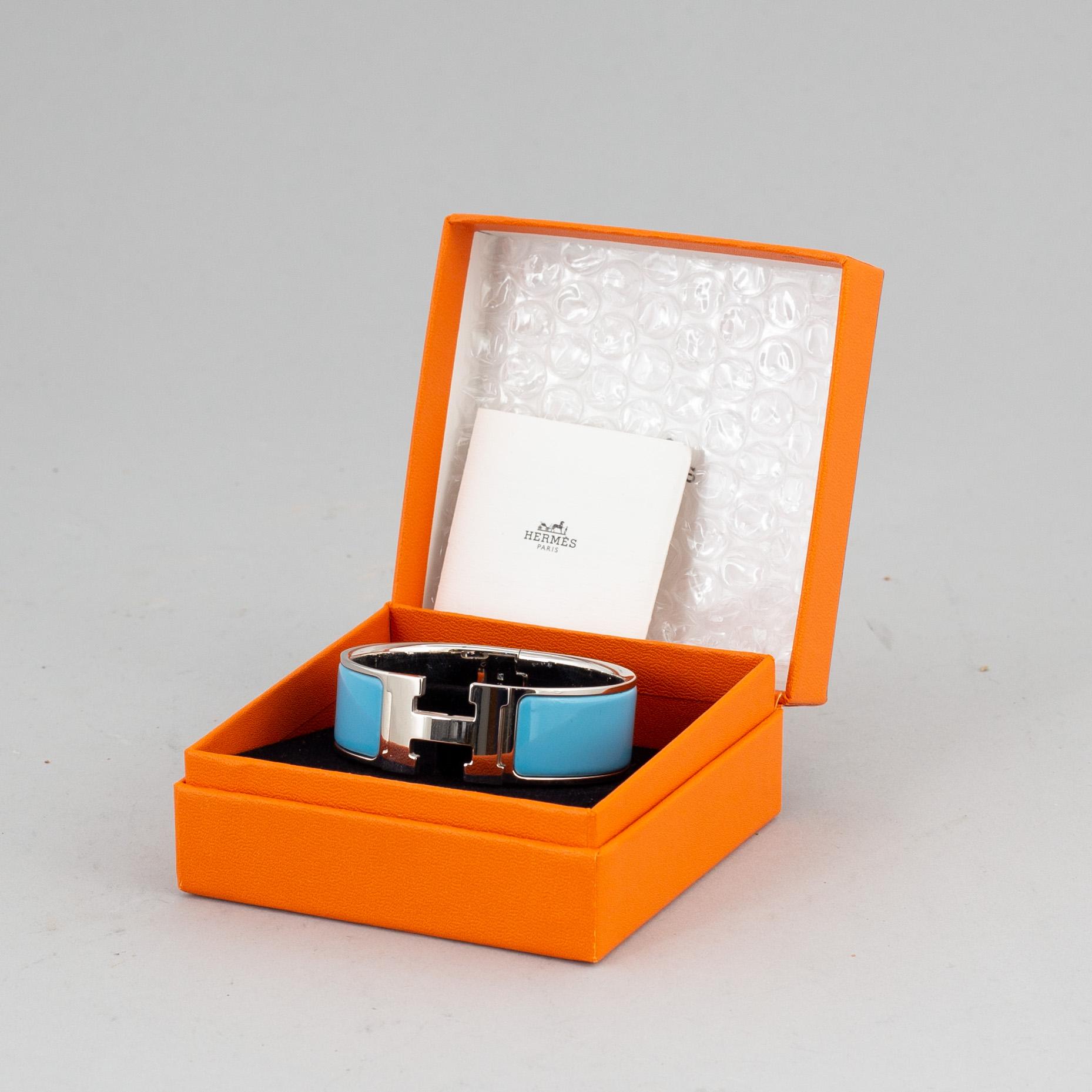 HERMÈS, a 'Clic H' bangle.
