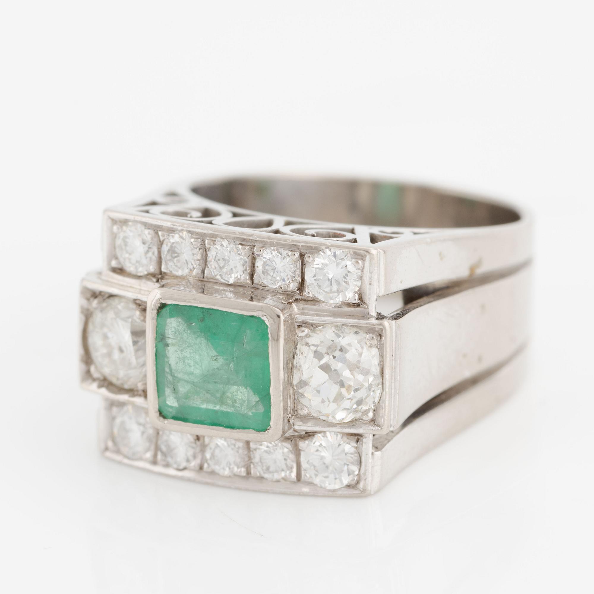 Ring, Hellström & Åhrling. 18K white gold with an emerald and old-cut and brilliant-cut diamonds.
