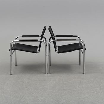 TORD BJÖRKLUND, a pair of 'Klinte' tubular steel easy chairs from IKEA.