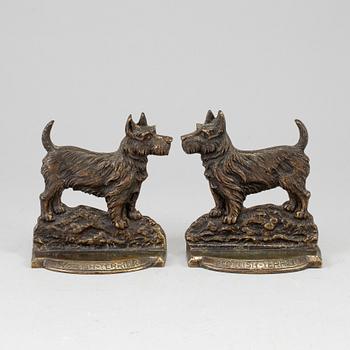 A pair of bronze 20th century book ends.