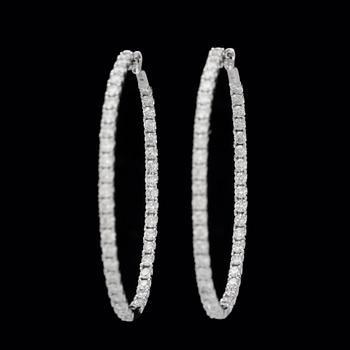A pair of brilliant-cut diamond hoop earrings. Total carat weight circa 5.63 cts.