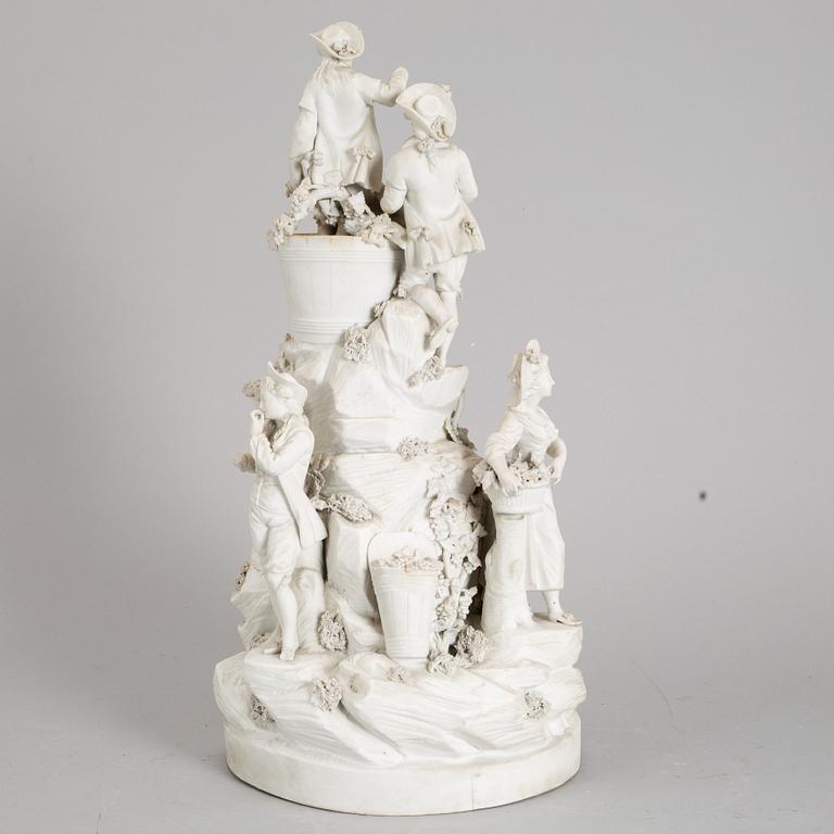 A biscuit porcelain figure group, circa 1900.