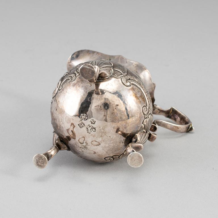 An English mid 18th century silver cream-jug, mark of David Hennell I, London 1754.