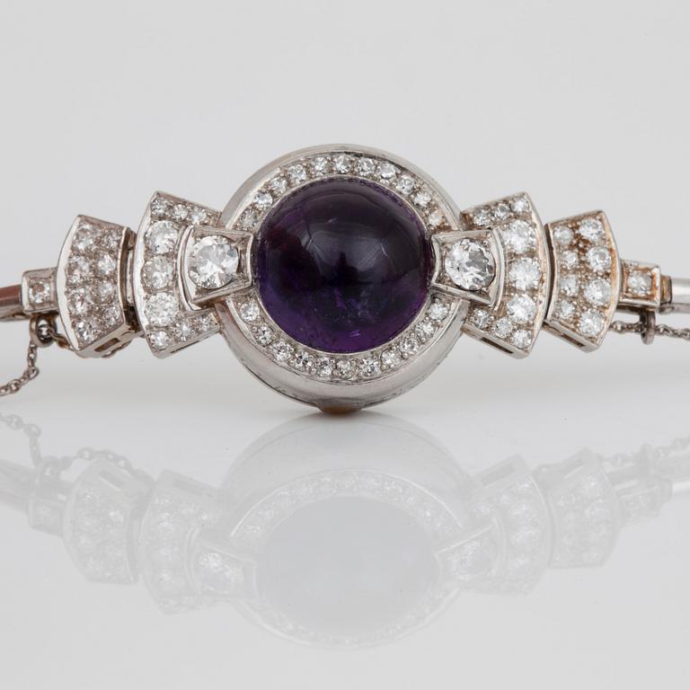 A cabochon-cut amethyst and old-cut diamond bracelet.