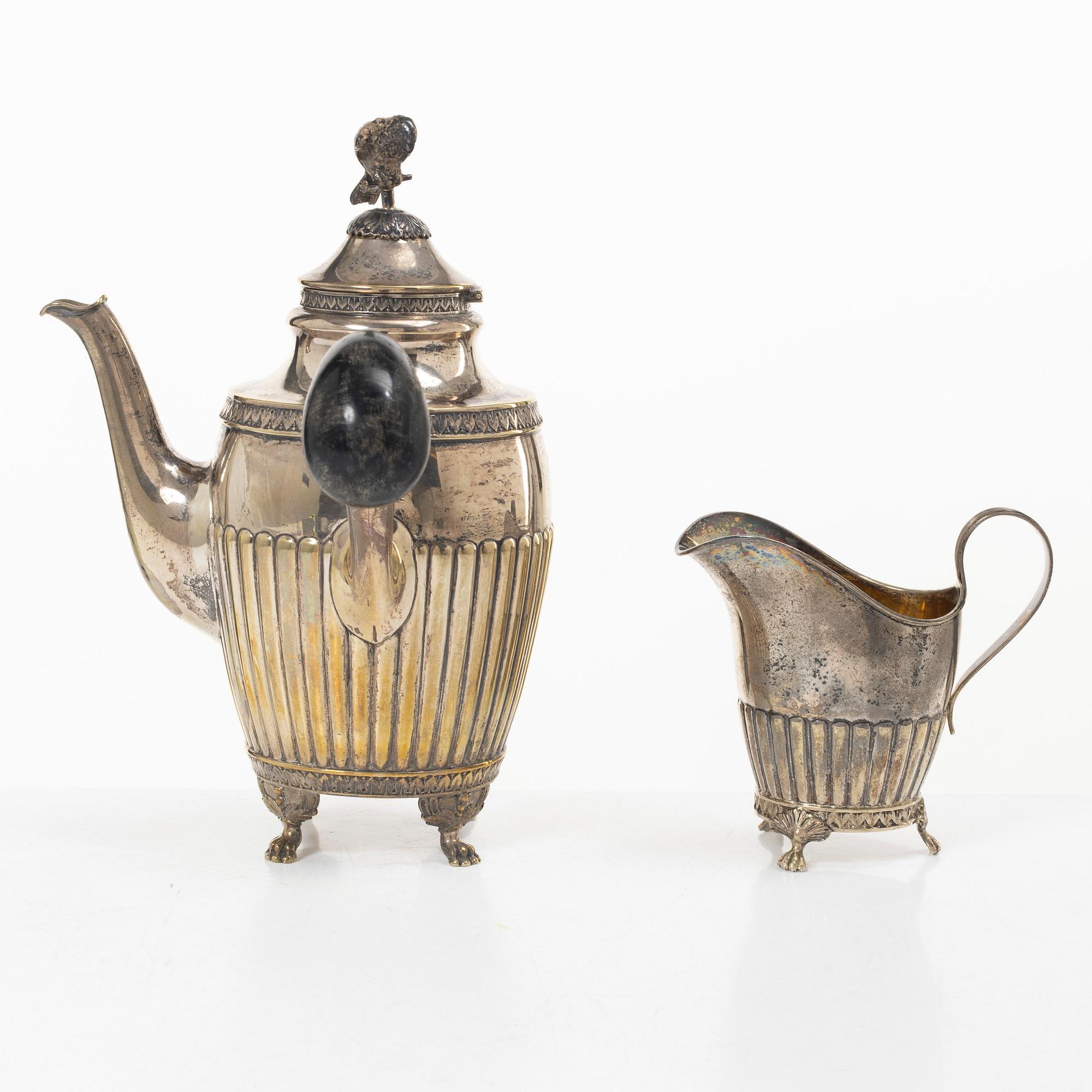 A Swedish silver coffee pot and cream jug, Gustavian style, early 20th century.