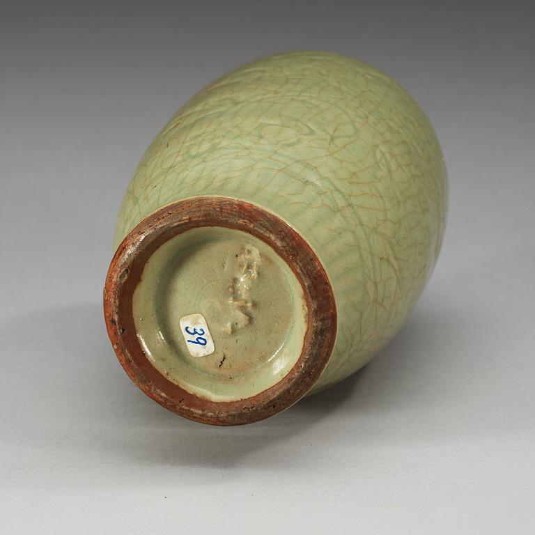 A celadon glazed vase, Ming dynasty.