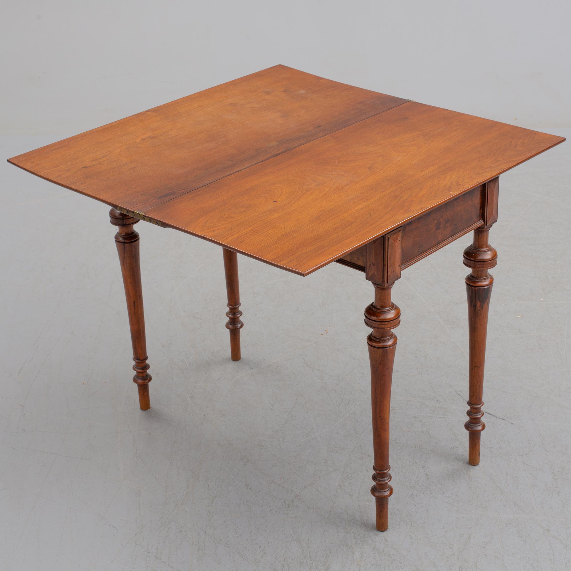 A late 19th century mahogany card table.