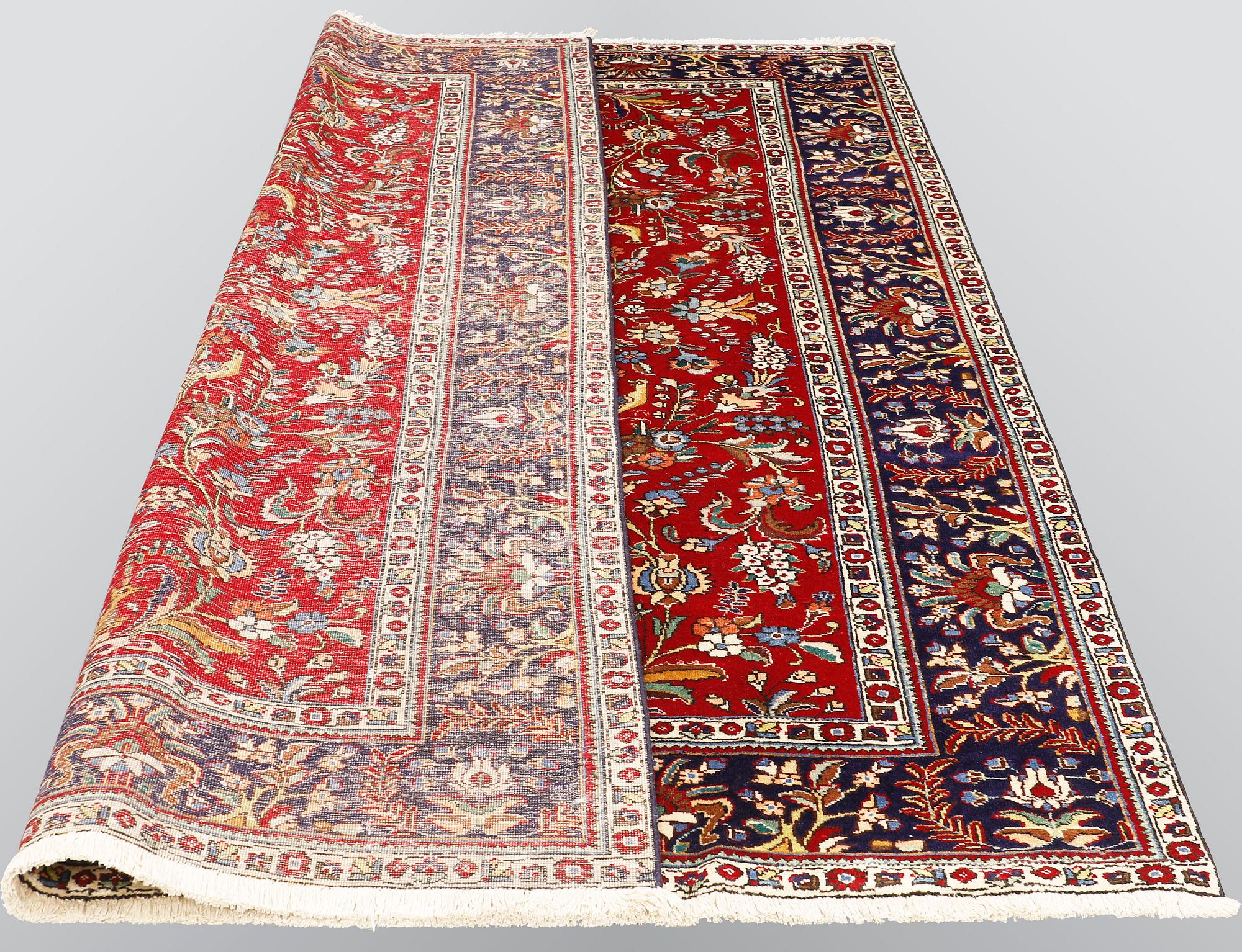 A carpet, Figural Tabriz, ca 310 x 220 cm.