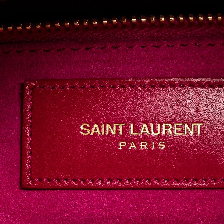 YVES SAINT LAURENT, a hot pink 'Classic duffle 6' bag.