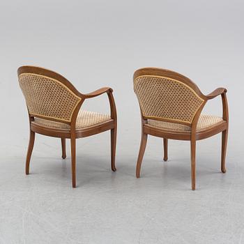 A pair of art noveu armchairs, early 20th Century.