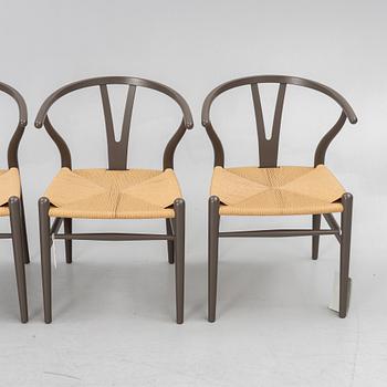 Hans J. Wegner, four CH 24 chairs, Carl Hansen & Son, Denmark.