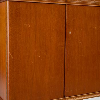A cabinet, around the mid-20th century.