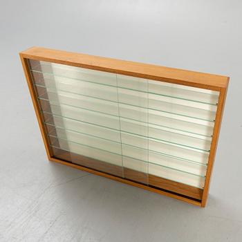 Glass display cabinet, second half of the 20th century.