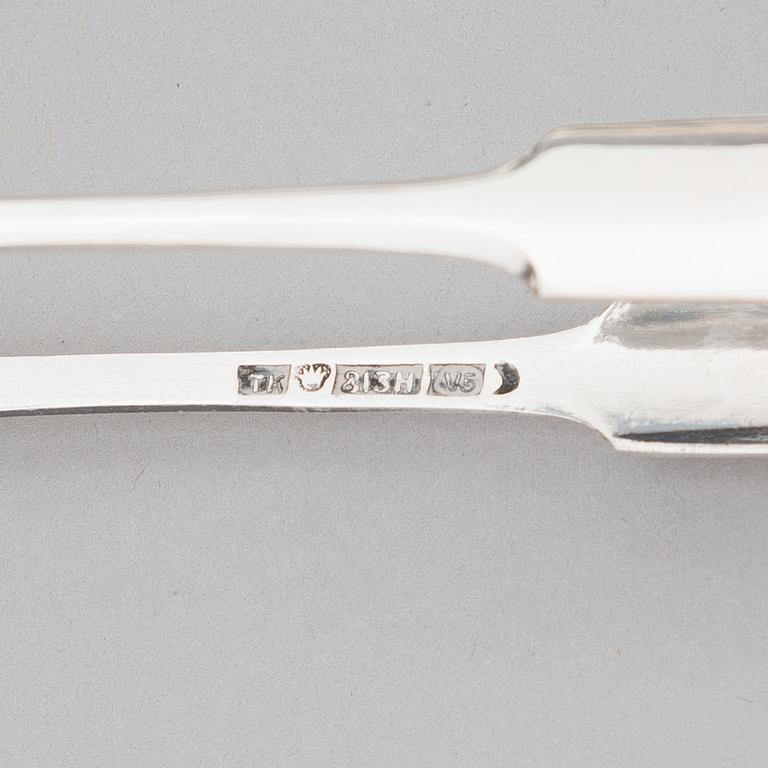 A 52-piece set of silver cutlery with seashell decoration, Finnish hallmarks 1922-1949.