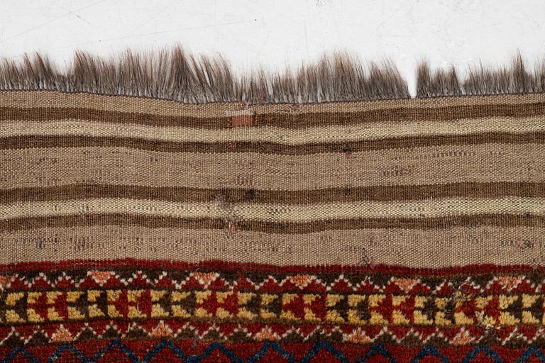 An antique Beshir carpet, ca 495 x 206 cm, around the year 1875.