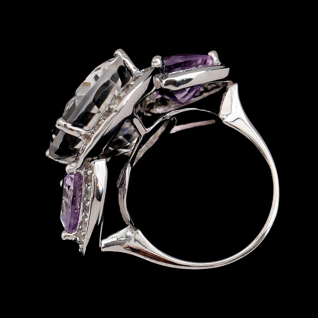 RING, sterlingsilver, topaser och ametister. Vikt ca 7,2 g.