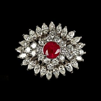 1163. RING, ruby, 1.61 ct and brilliant- and navette cut diamonds, tot. app. 4 cts.