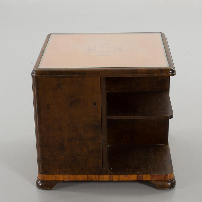 A 1940's smoking table.
