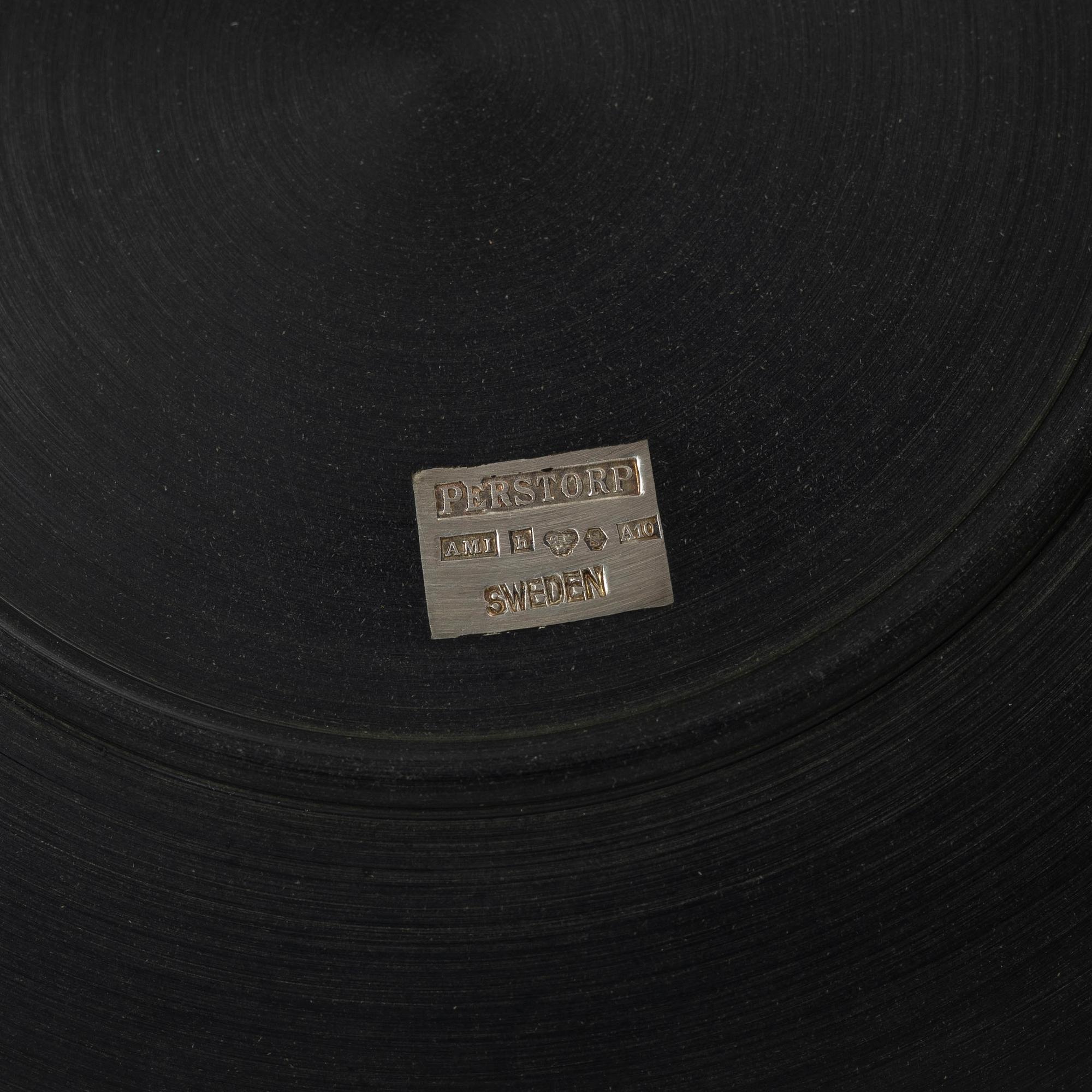 Five dishes, and one box with gaming chips, isolite with silver decor, Perstorp, Sweden, mid-20th century.