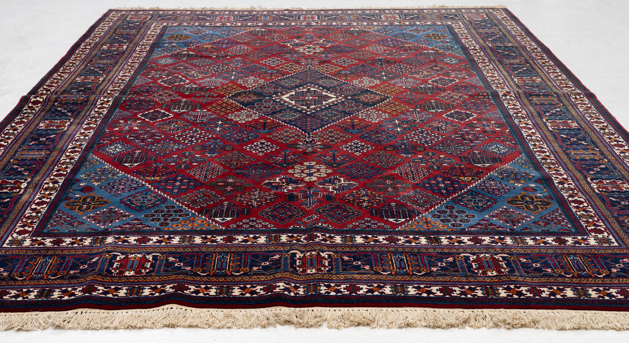 An Antique Joshagan carpet, central Persia, c. 340 x 240 cm.