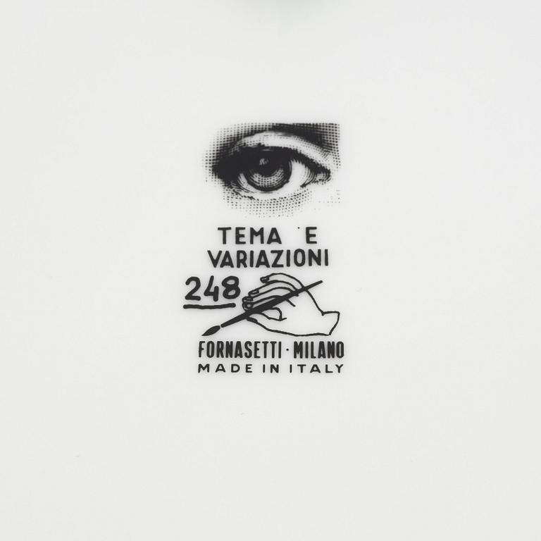 Piero Fornasetti, a porcelain dish and a plate, Milano, Italy.