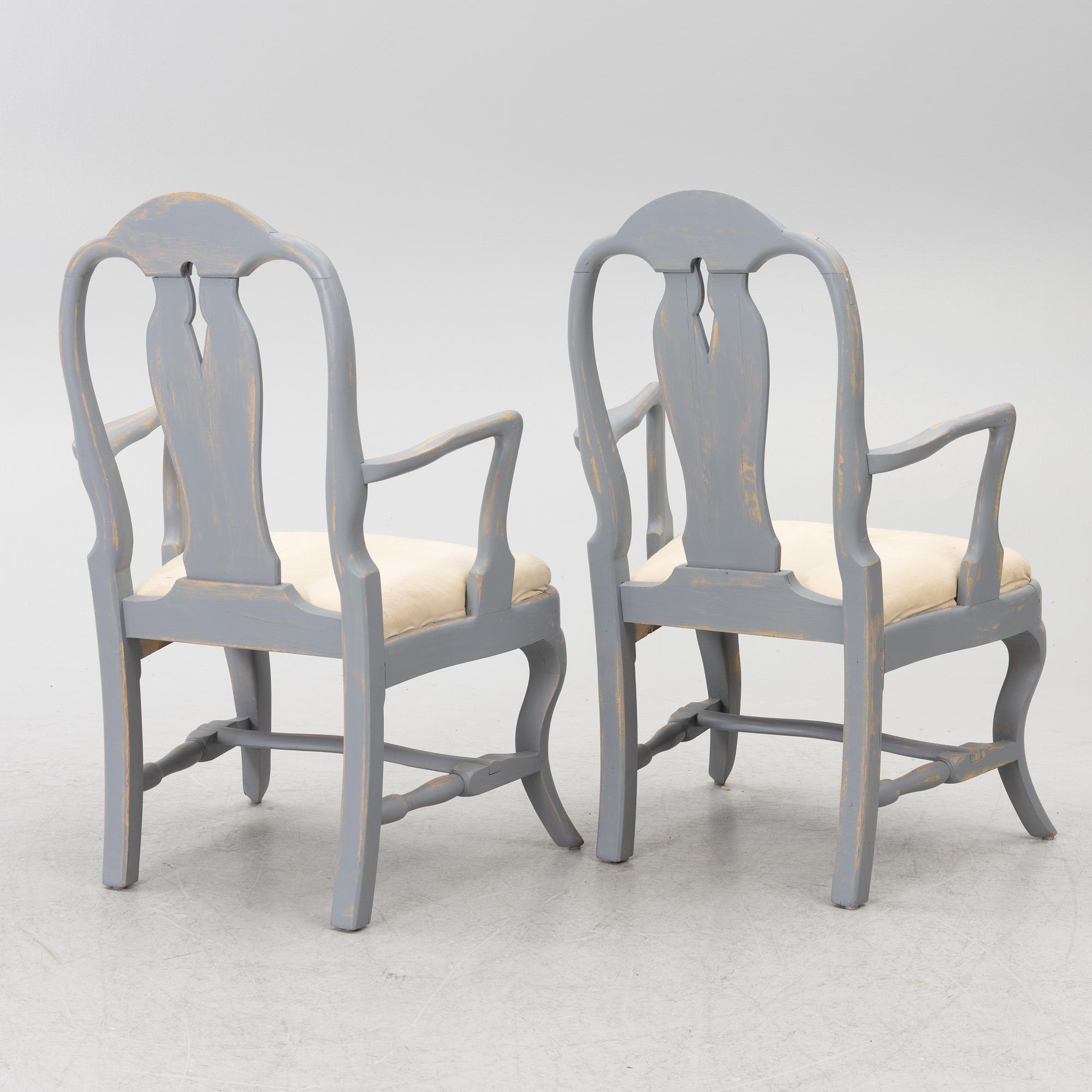 A pair of Rococo style armchairs, early 20th Century.