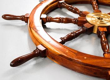 A 20th century boat steering wheel.