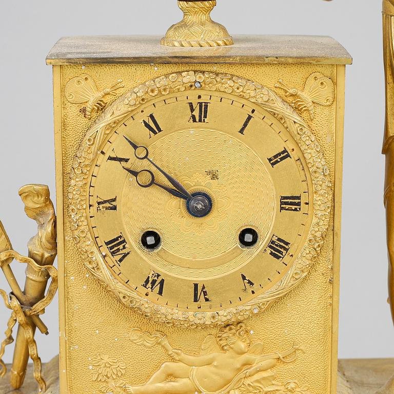 An Empire mantel clock, beginning of the 19th ct.