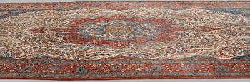 A carpet, a semi-antique Qum, ca 380,5-387,5 x 250,5-259,5 cm.