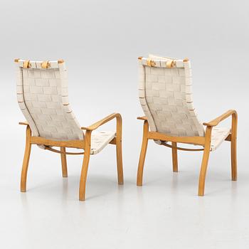 Yngve Ekström, a pair of "Primo" armchairs with ottomans, Swedese, Sweden,