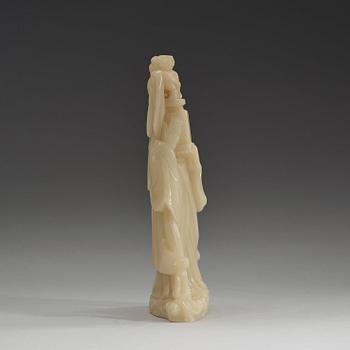 A Chinese soapstone figure of Guanyin, early 20th Century.