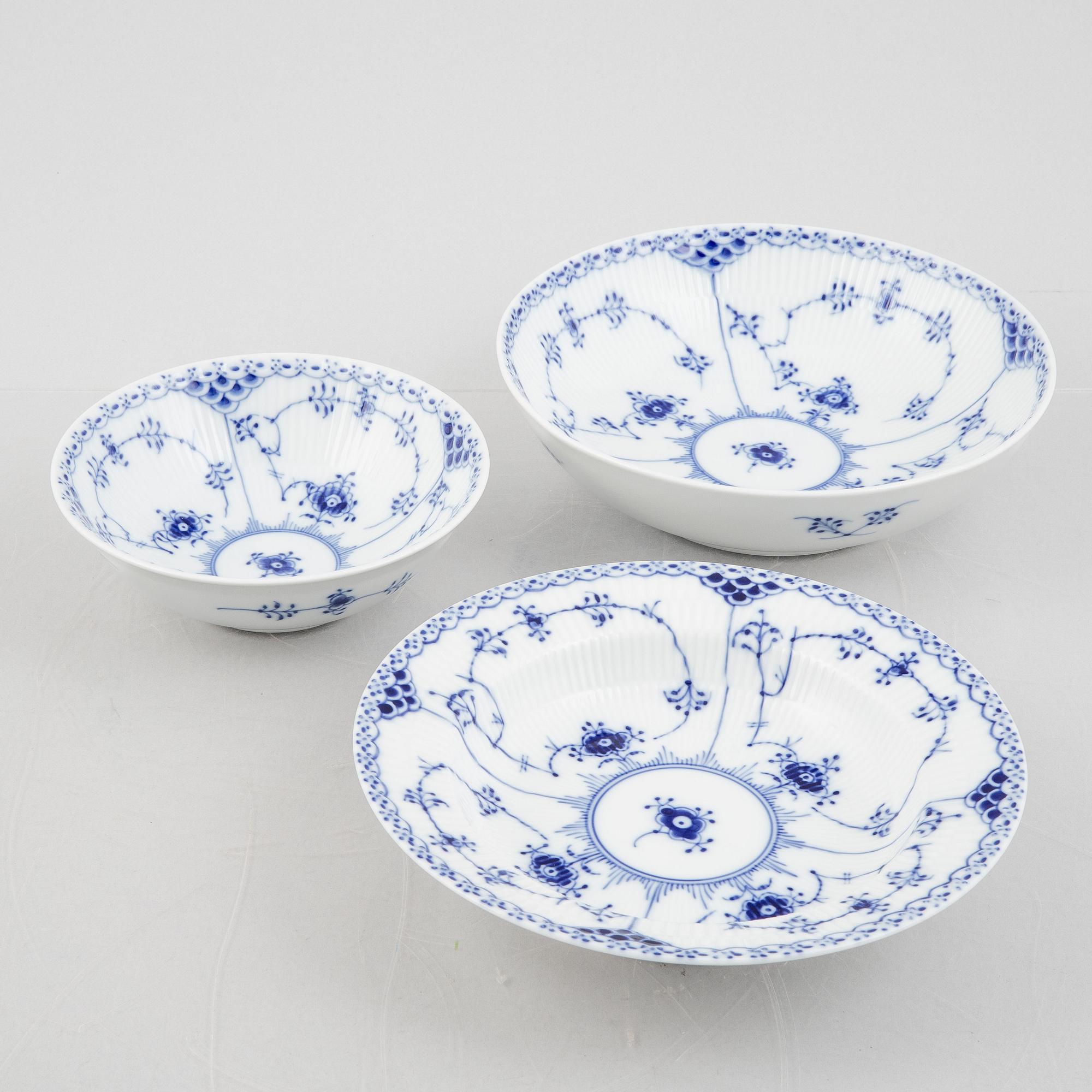 An 80-piece 'Blue Fluted' porcelain dinner and coffee service, Royal Copenhagen, Denmark.