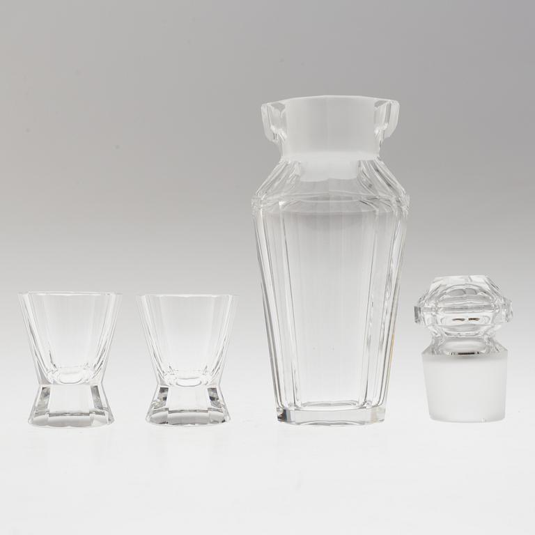 A set of twelve glasses and a cocktailshaker by Elis Berg, Kosta.