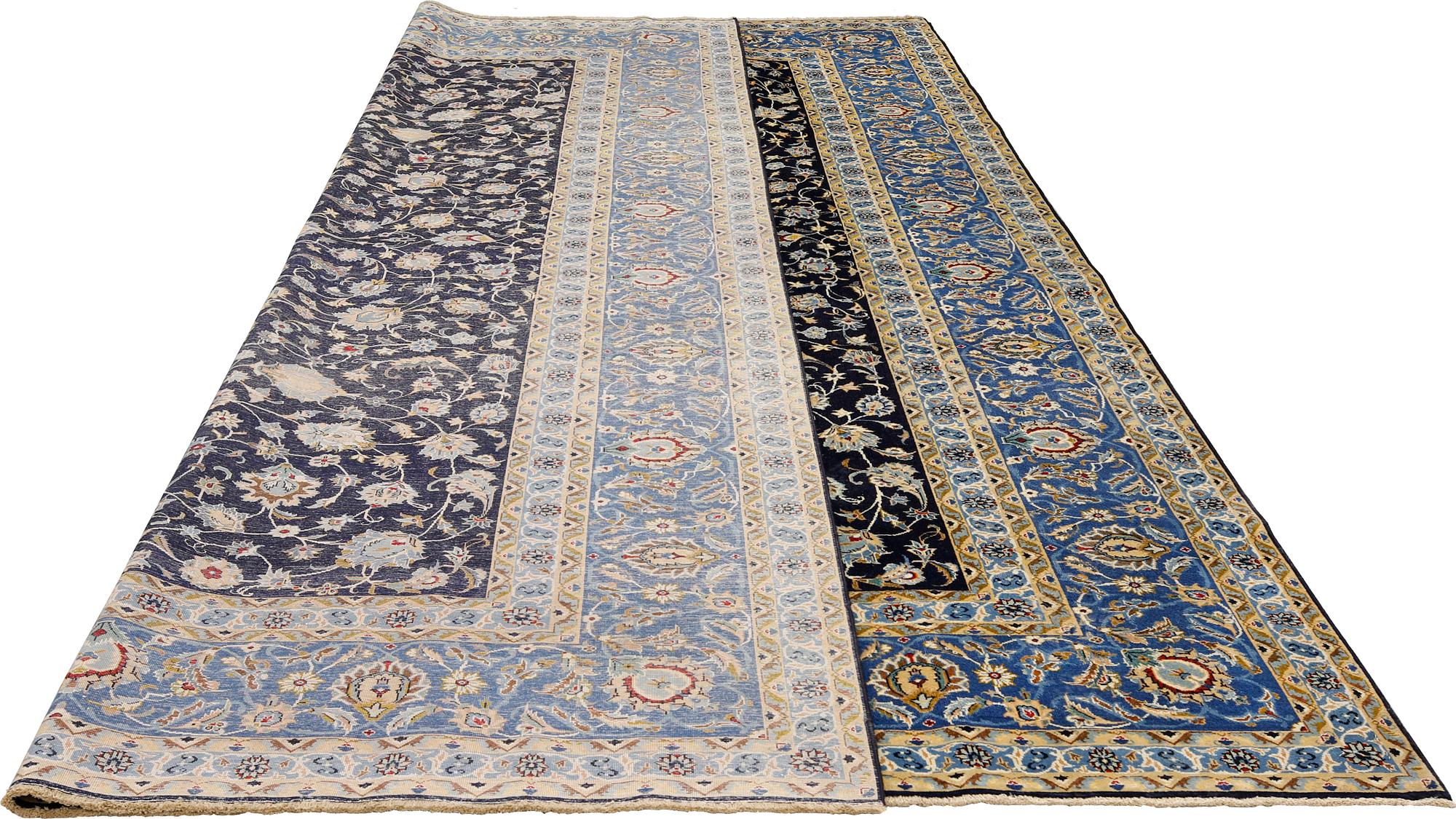 A Kashan carpet of 'Shah Abbas' design, c 376 x 276 cm.