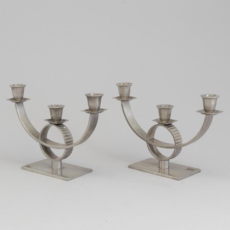 A pair of pewter candelabra, 1920's/30's.