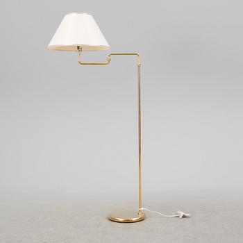 A second half of the 20th century brass wall light and a table light.